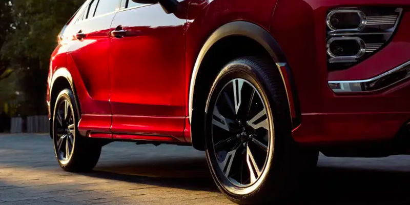 2026 Red Mitsubishi Eclipse Cross in it's side profile 