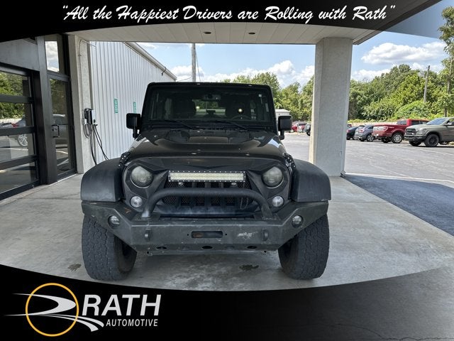 Used 2015 Jeep Wrangler Unlimited Sport with VIN 1C4BJWDG1FL659549 for sale in Springdale, AR
